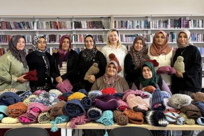 Niğdeli kadınlar Ahlatlı köy çocuklarının içini ısıttı
