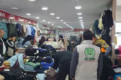Umut Kervanından Van'da ihtiyaç sahibi çocuklara kışlık yardım